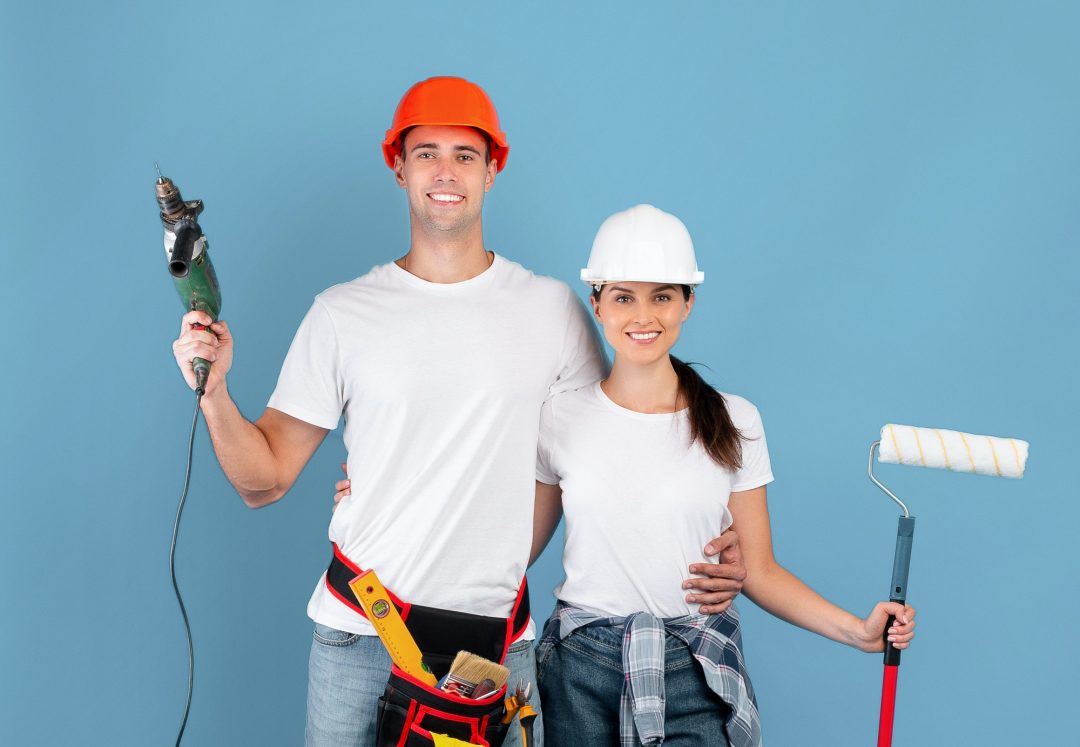 couple with drill and roller Image